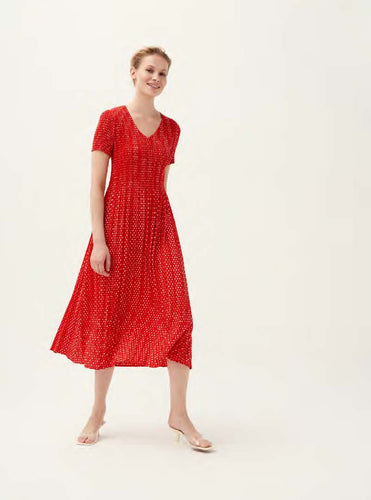 Model wearing Leo & Ugo - Leaf Print Pleat Dress in Red/White.