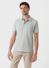 Load image into Gallery viewer, Model wearing Sunspel Riviera Polo Shirt in Laurel.
