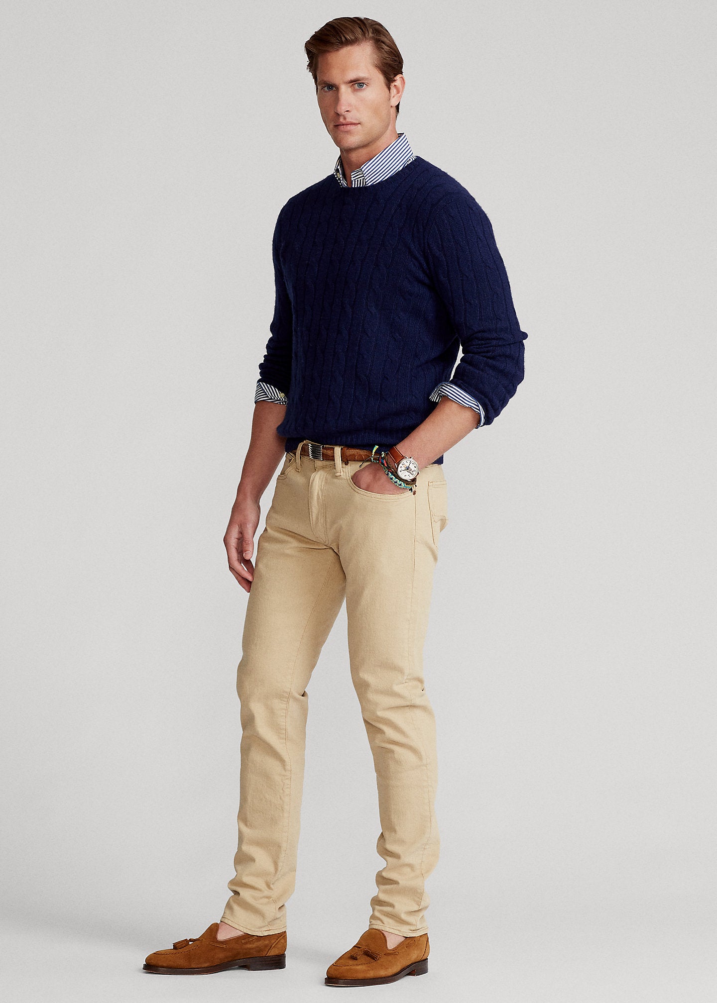 Model wearing POLO Ralph Lauren Sullivan Slim Jean in Khaki.