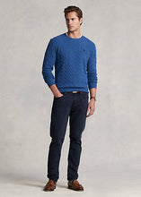 Load image into Gallery viewer, Model wearing POLO Ralph Lauren - Sullivan Slim Knitlike Chino Pant in Avaitor Navy.
