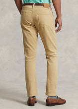Load image into Gallery viewer, Model wearing POLO Ralph Lauren - Sullivan Slim Knitlike Chino Pant in Boating Khaki - back.
